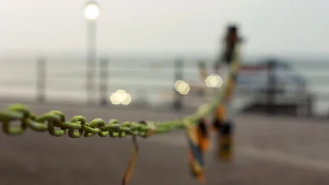 Focus Pull Between Cromer Pier UK and Chain in Foreground Vídeo Stock 94471278
