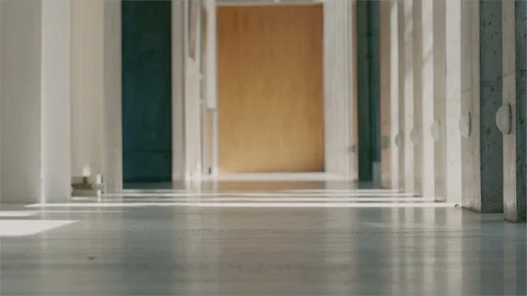 Focus pull of building architectural hallway low angle Stock Footage 102752645