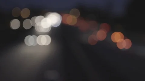 Focus Pull Highway Traffic at Night Stock Footage 73874510
