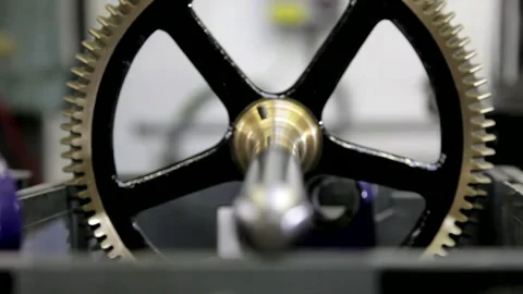Focus Pull on Large Industrial Gear and Drive Shaft 库存影片 345751603