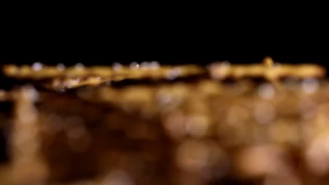 Focus pull macro shot through pile of salt sticks Stock Footage 123394375