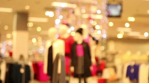 Focus pull in mannequins in clothes shop with christmas decorations Stock Footage 44641606