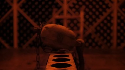 Focus Pull of Medieval Chain and Wood Device to Wine Cellar Stock Footage 122230051