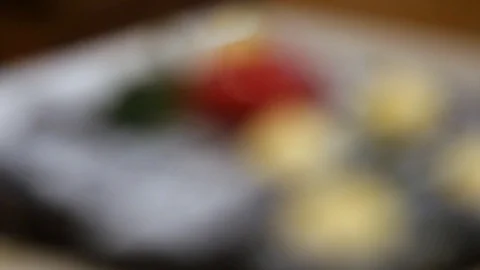 Focus pull on a plate of brownies Stock Footage 126716025