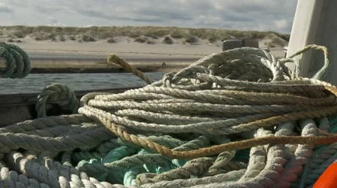 Focus pull from rope/boat too beach (pro res) Video stock 11845571