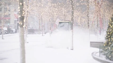 Focus Pull on Snow Moving Machine Zuccotti Park New York City Stock Footage 71262566
