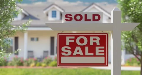 Focus Pull of Sold For Sale Real Estate Sign in Front of New House Stock Footage 206795241