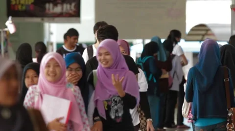 Focus Pull of Students Walking in A Hallway in USM, Penang Stock Footage 49387609