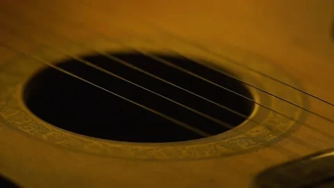 Focus Pull Through Guitar Strings Video stock 236423807