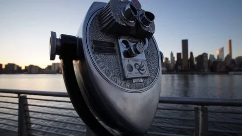 Focus Pull Time-lapse of a coin operated viewing machine and New York City Stock Footage 90263644