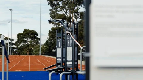 FOCUS PULL Track And Outdoor Fitness Equipment Closed, Coronavirus Video stock 128167883