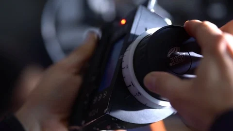 Focus puller using an arri follow focus, slow motion Stock Footage 88222588