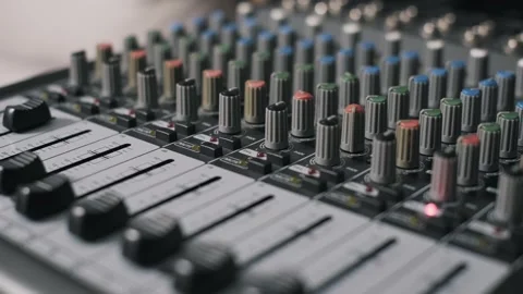 Focus Pulling Across Audio Console Faders to Knobs Video stock 319067921