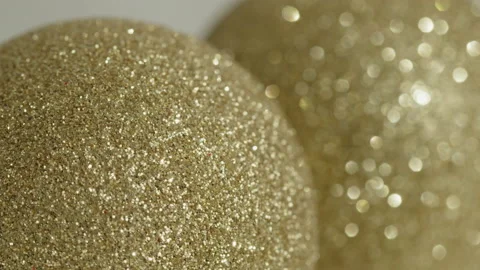 Focus pulling between golden baubles 4K video Stock Footage 201312939