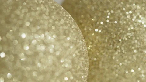 Focus pulling on golden bauble with sequins 4k video Stock Footage 203854507