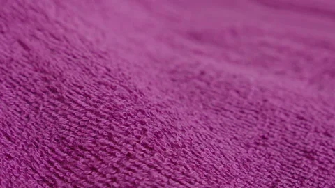 Focus pulling on pink bath towel 4K video Stock Footage 217427837