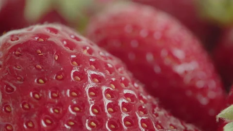 Focus pulling on red strawberry  pile 4K footage Stock Footage 197009129
