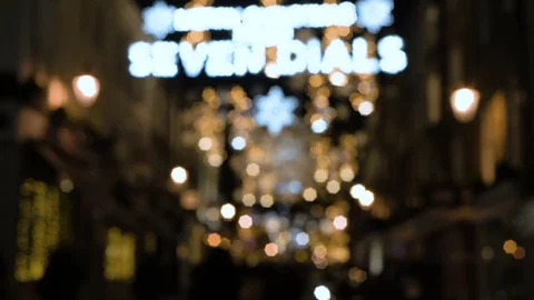 Focus ramping view of Christmas lights in Covent Garden, London Stock Footage 102436616