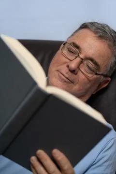 Focus reading book Stock Photos