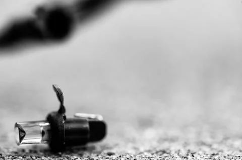 Focus on replacement bulb for a string of Christmas lights to repair a dud. Stock Photos