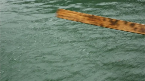 Focus On Rowboat rowing along the river Video stock 107581249