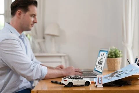 Focus scale EV car and charging station mockup model. Synchronos Foto stock