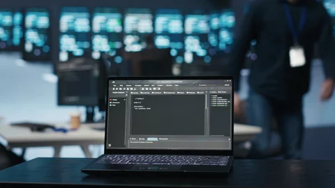 Focus on script running on laptop in server room, close up shot Stock Footage 274529237