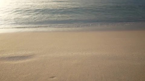 Focus at sea wave hit sand beach and defocus in the end  , put your product o Stock Footage 99485482