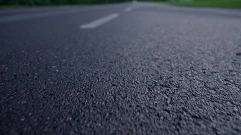 Focus Shift from Asphalt to Empty Park Path Video stock 347811219