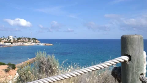 Focus shift from beach grass to the entire bay in sunshine. Stock Footage 152856245
