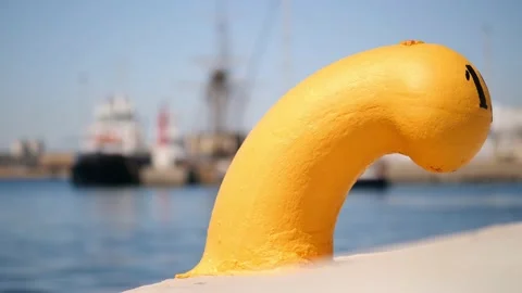 Focus shift from a bollard to a white sailing yacht. Stock Footage 152790566