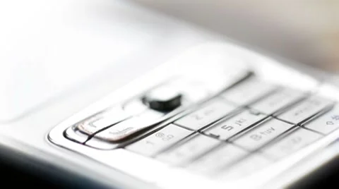 Focus shift in macro to show a mobile phone keypad 스톡 동영상 8915825