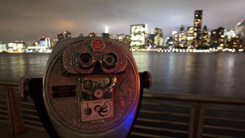 A Focus Shift Motion Time-lapse of Coin Viewing machine and New York City Stock Footage 95400563