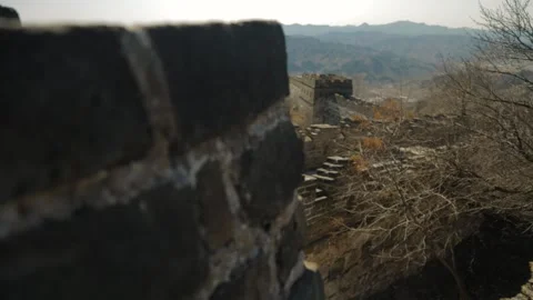 Focus Shift from Stone Wall to Mutianyu Great Wall Ruins and Mountain Landscape Stock Footage 345826963