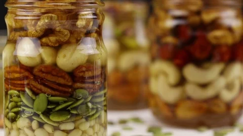 Focus shift in turn to each of the three jars Stock Footage 124681121