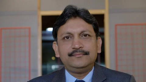 Focus shit from hand raised with a thumbs up in a best of luck sign by a middle  Stock Footage 102417698