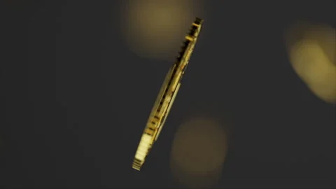 Focus on a single bitcoin falling Stock Footage 253590206