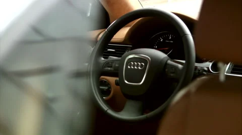 Focus on a steering wheel of outstanding Audi A8 L, Audi Exclusive Limousine Stock Footage 49200996