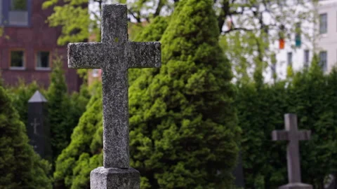 Focus on stone cross at a old graveyard. Version 4 Stock Footage 274598041