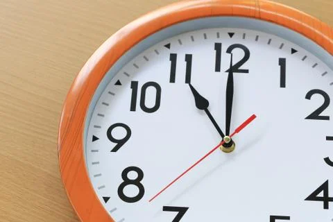 Focus time in clock of eleven o'clock for the design in your business concept Stock Photos