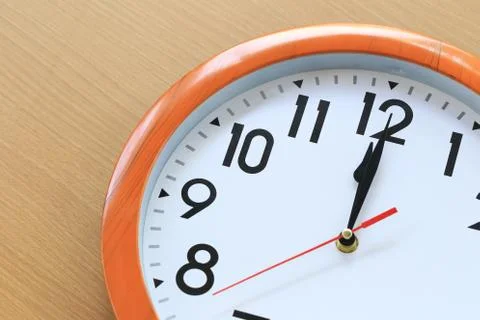 Focus time in clock of twelve o'clock for the design in your business concept Stock Photos