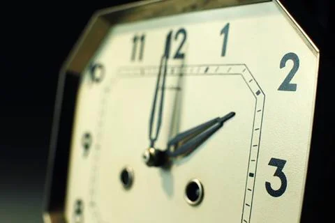 Focus on tips of hand with strong depth of field on an antique watch Stock Photos