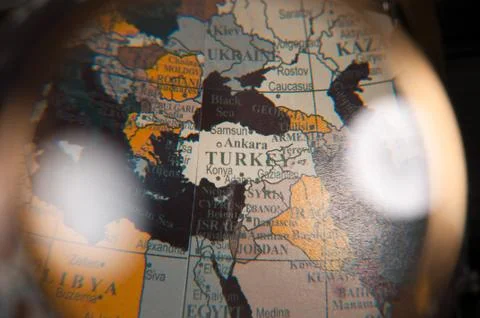 Focus on Turkey world map under magnifying glass Фото