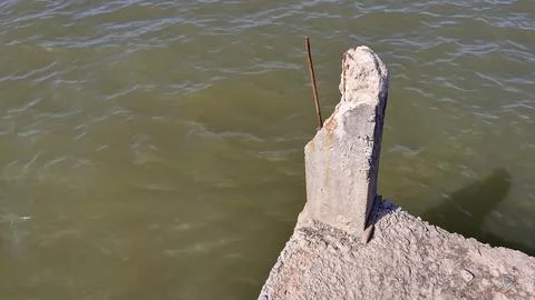 Focus view of broken pillar in the beach Stock Photos