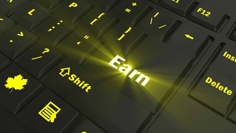Focus on the yellow glowing Earn button Stock Footage 100683327