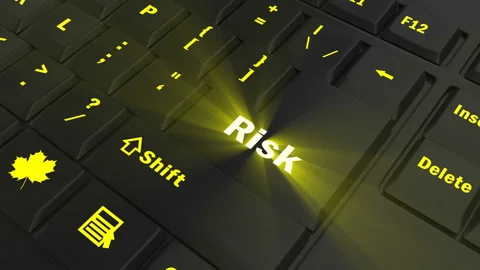 Focus on the yellow glowing Risk button Stock Footage 100689335