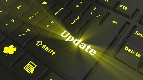 Focus on the yellow glowing Update button Stock Footage 100681377