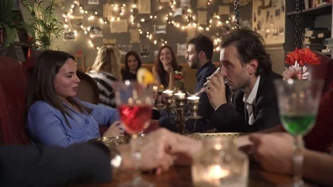 Focus on young couple flirting during class party Stock-Footage 74722428