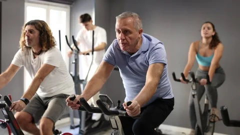 Focused aged man leading healthy active lifestyle doing cardio workout on Stock Footage 341526247