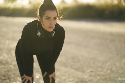 A Focused and Committed Athlete in Action During an Intense Outdoor Workout Stock Photos